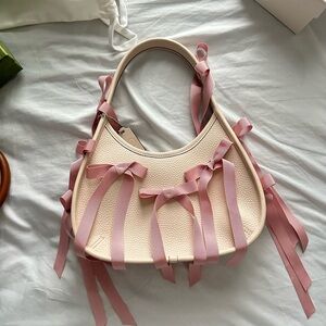 Coach Ergo bag with pink bows